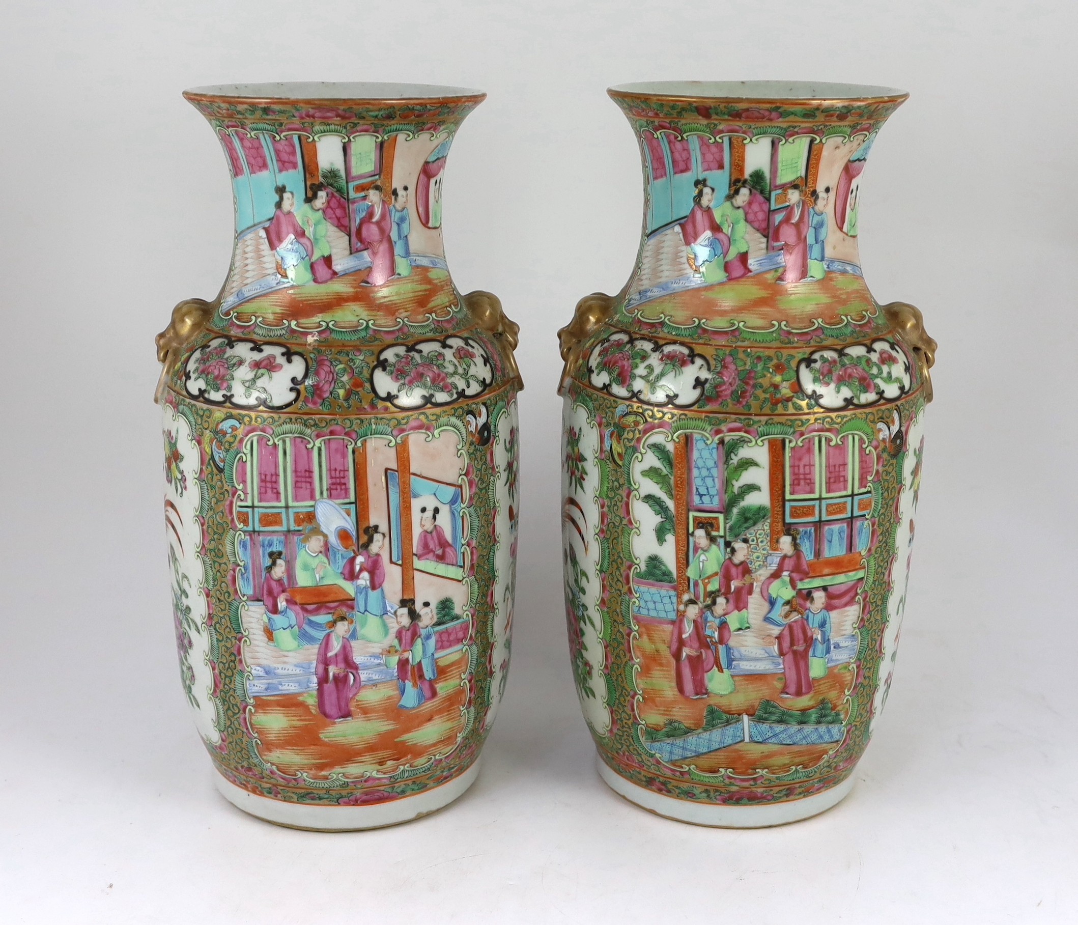 A pair of Chinese famille rose vases, 19th century, 36.5 cm high